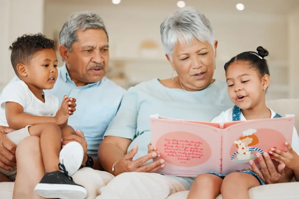 Grandparents Reading a Book to Their Grandchildren
