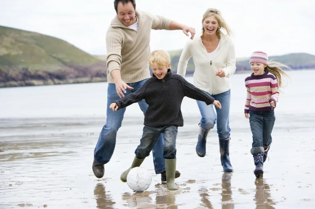 Family Playing at the Beach