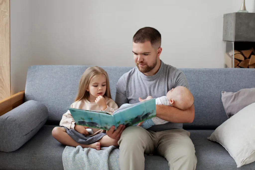 Father Reading Story to His Kids