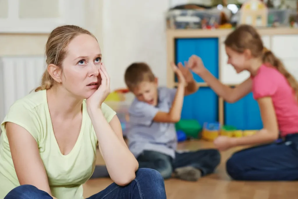 Exhausted Mother Frustrated and Upset from Children Behaviour