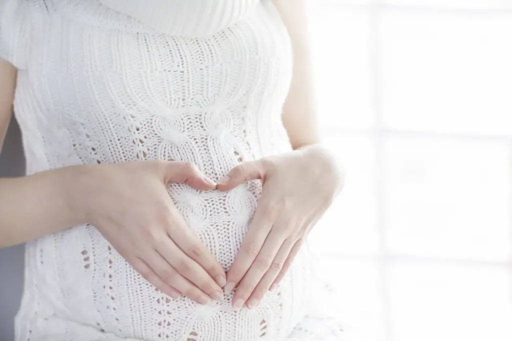 Pregnant Woman Belly with Heart Shape
